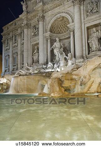 Stock Image - Trevi fountain and statues, Rome, Italy. Fotosearch