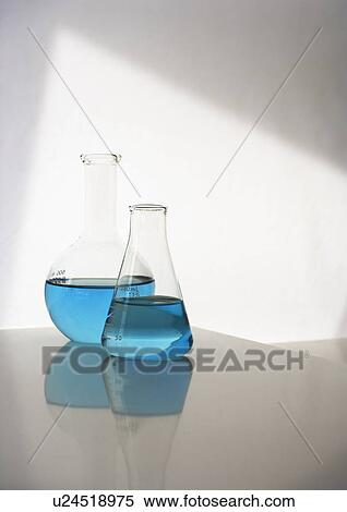 Two beakers with liquid View Large Photo Image Stock Photography - Two beakers with liquid. Fotosearch