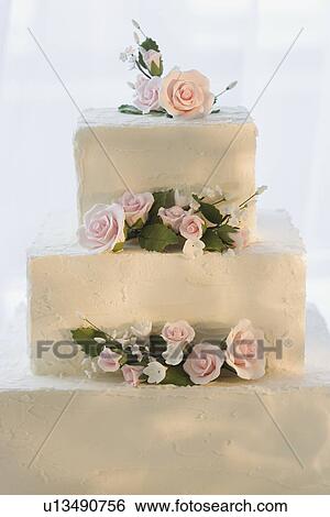 Stock Photograph - Wedding cake with flowers. Fotosearch