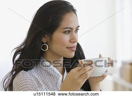 Woman drinking coffee View Large Photo Image Stock Photo - Woman drinking coffee. Fotosearch