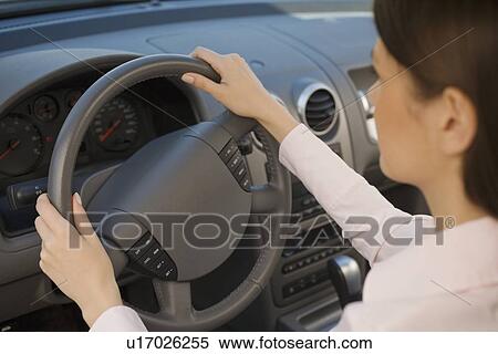 Woman driving car View Large Photo Image Stock Photography - Woman driving car. Fotosearch