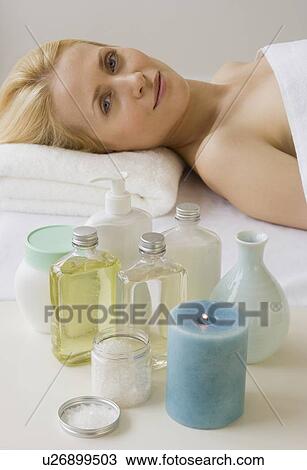 Woman laying on spa table View Large Photo Image Stock Image - Woman laying on spa table. Fotosearch