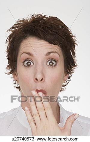 Woman making surprised face View Large Photo Image Stock Image - Woman making surprised face. Fotosearch