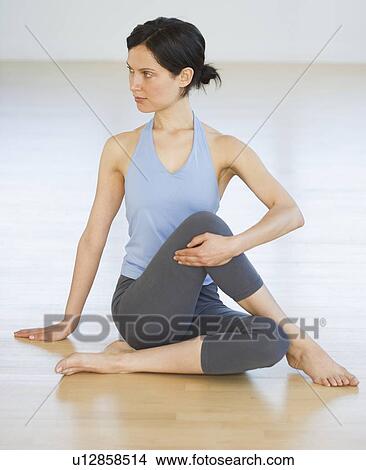 Woman practicing yoga View Large Photo Image Picture - Woman practicing yoga. Fotosearch