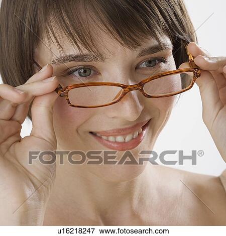 Stock Photo - Woman wearing eyeglasses. Fotosearch