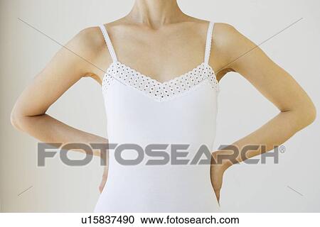 Stock Image - Woman with hands on hips. Fotosearch