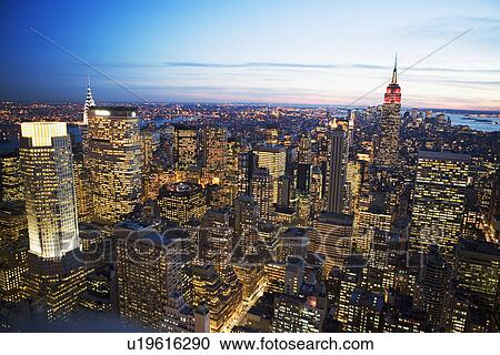 Aerial view of New York City at dusk View Large Photo Image Stock Image - Aerial view of New York City at dusk. Fotosearch