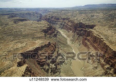 Stock Photo - Aerial view of river in canyon, Colorado River, Canyonlands National Park, Moab, Utah, United States. Fotosearch