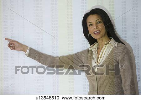 African businesswoman giving presentation View Large Photo Image Stock Image - African businesswoman giving presentation. Fotosearch