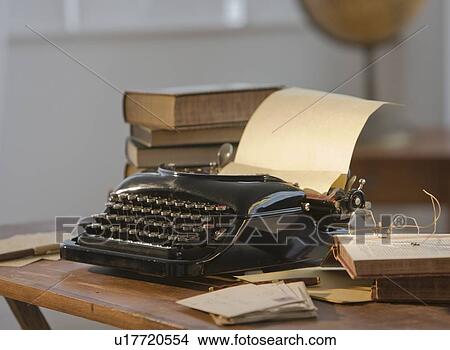 Antique typewriter on table View Large Photo Image Picture - Antique typewriter on table. Fotosearch
