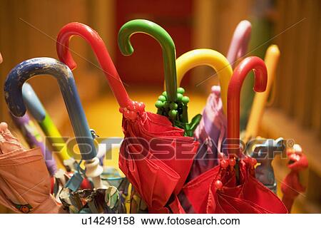 Stock Photo - Assorted closed umbrellas . Fotosearch