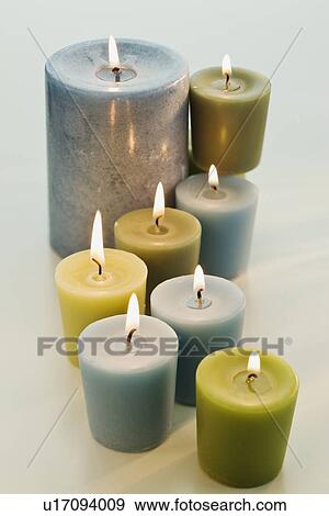 Assorted lit candles View Large Photo Image Stock Photo - Assorted lit candles. Fotosearch