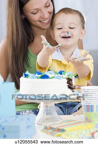 Baby eating birthday cake View Large Photo Image Stock Image - Baby eating birthday cake. Fotosearch