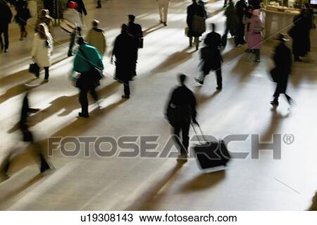 Stock Image - Blurred motion shot of people, Grand Central Station, New York City. Fotosearch
