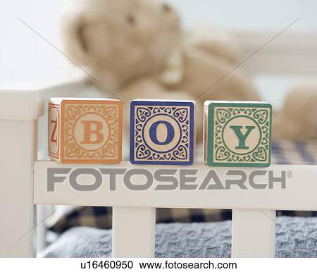 Boy spelled out with blocks on crib View Large Photo Image Stock Image - Boy spelled out with blocks on crib. Fotosearch