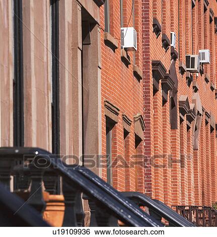 Stock Photograph - Brick buildings in urban area. Fotosearch