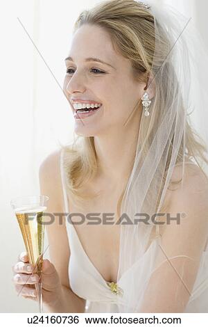 Bride drinking champagne View Large Photo Image Stock Photograph - Bride drinking champagne. Fotosearch