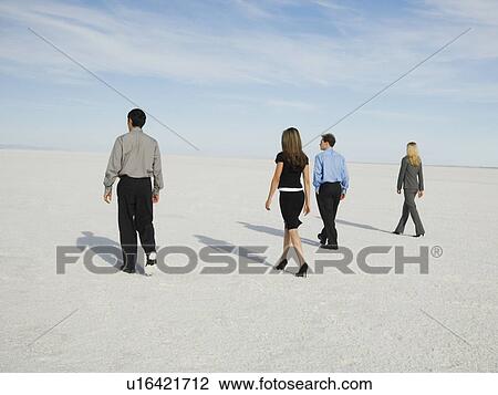 Businesspeople walking on salt flats, Salt Flats, Utah, United States View Large Photo Image Stock Image - Businesspeople walking on salt flats, Salt Flats, Utah, United States. Fotosearch
