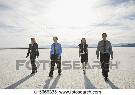 Businesspeople walking on salt flats, Salt Flats, Utah, United States View Large Photo Image Stock Photography - Businesspeople walking on salt flats, Salt Flats, Utah, United States. Fotosearch