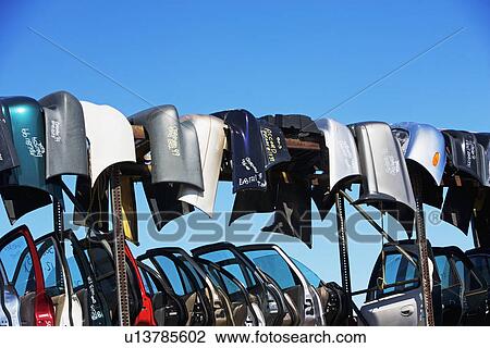 Car doors and bumpers at junkyard View Large Photo Image Stock Image - Car doors and bumpers at junkyard. Fotosearch