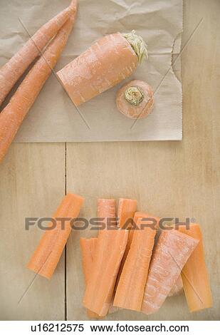 Chopped carrots on cutting board View Large Photo Image Stock Photography - Chopped carrots on cutting board. Fotosearch