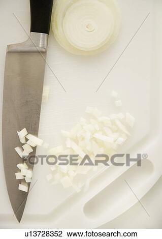 Chopped onions on cutting board View Large Photo Image Stock Image - Chopped onions on cutting board. Fotosearch