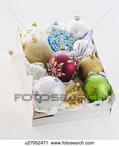 Christmas ornaments on box View Large Photo Image Stock Image - Christmas ornaments on box. Fotosearch