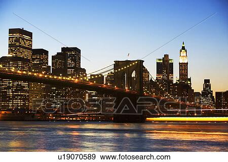 City skyline and bridge at night View Large Photo Image Stock Photo - City skyline and bridge at night. Fotosearch