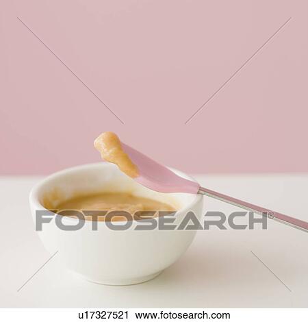 Close up of baby food and spoon View Large Photo Image Stock Image - Close up of baby food and spoon. Fotosearch