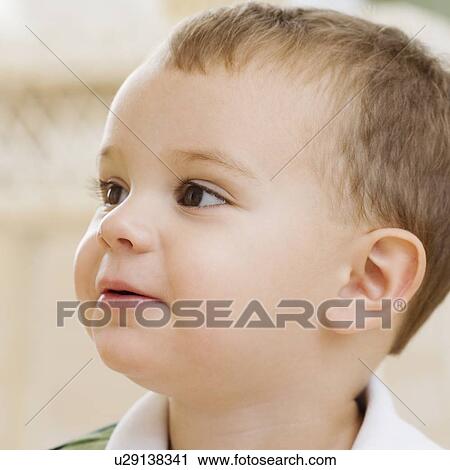 Close up of baby looking to side View Large Photo Image Stock Image - Close up of baby looking to side. Fotosearch