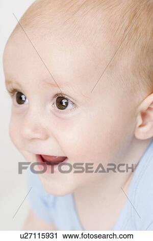 Close up of baby smiling View Large Photo Image Stock Image - Close up of baby smiling. Fotosearch