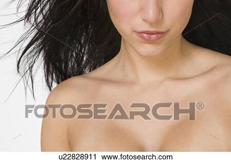 Stock Image - Close up of bare shouldered woman. Fotosearch