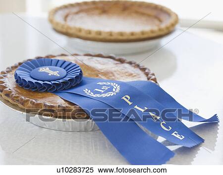 Close up of blue ribbon on pie View Large Photo Image Stock Photography - Close up of blue ribbon on pie. Fotosearch