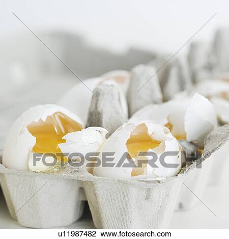 Close up of broken eggs in carton View Large Photo Image Stock Image - Close up of broken eggs in carton. Fotosearch