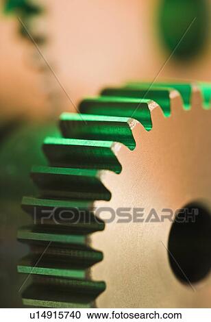 Stock Image - Close up of cog wheels. Fotosearch