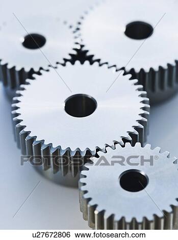 Stock Photograph - Close up of cog wheels. Fotosearch