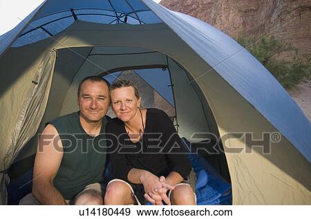 Close up of couple in tent View Large Photo Image Stock Photo - Close up of couple in tent. Fotosearch