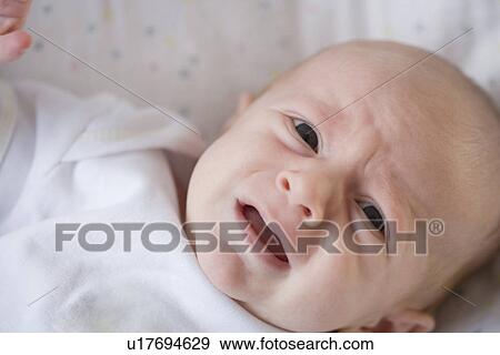Close up of crying baby View Large Photo Image Stock Photo - Close up of crying baby. Fotosearch