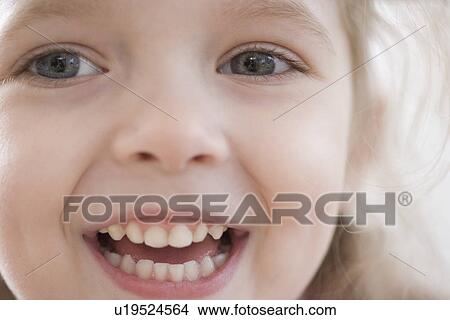 Close up of girl laughing View Large Photo Image Picture - Close up of girl laughing. Fotosearch