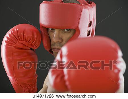 Stock Photograph - Close up of Hispanic male boxer. Fotosearch