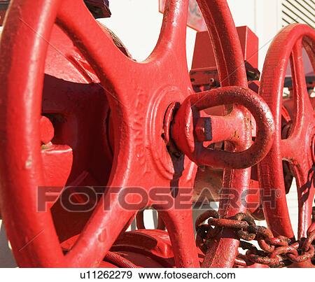 Stock Photo - Close up of large valves. Fotosearch