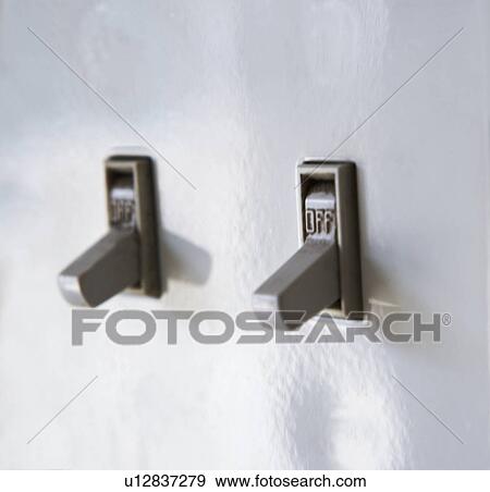 Close up of light switches View Large Photo Image Stock Photo - Close up of light switches. Fotosearch