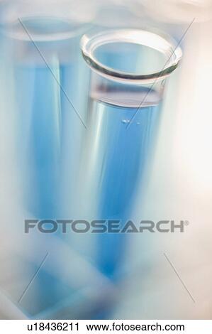 Stock Image - Close up of liquid in vials. Fotosearch