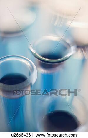 Close up of liquid in vials View Large Photo Image Stock Image - Close up of liquid in vials. Fotosearch