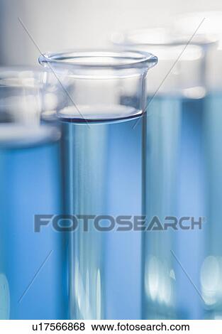 Close up of liquid in vials View Large Photo Image Stock Photo - Close up of liquid in vials. Fotosearch