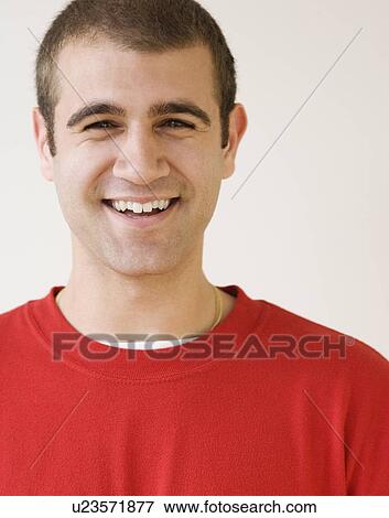 Close up of man smiling View Large Photo Image Stock Photo - Close up of man smiling. Fotosearch