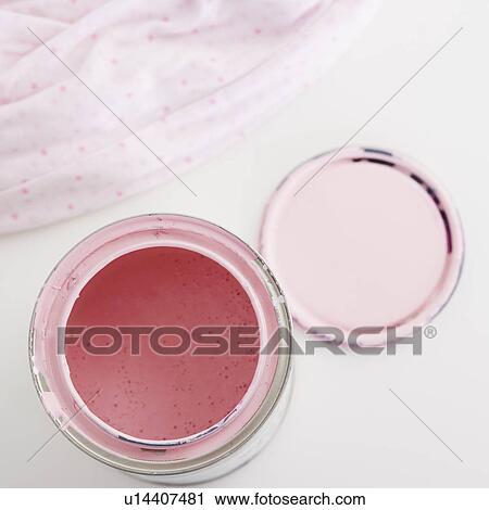 Stock Image - Close up of open paint can. Fotosearch