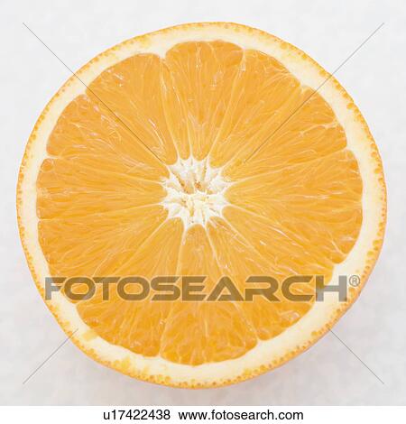 Close up of orange half View Large Photo Image Stock Photo - Close up of orange half. Fotosearch