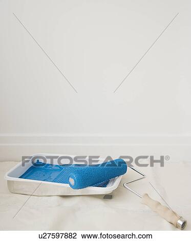 Close up of paint roller in tray View Large Photo Image Stock Image - Close up of paint roller in tray. Fotosearch