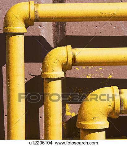 Picture - Close up of pipes on building. Fotosearch